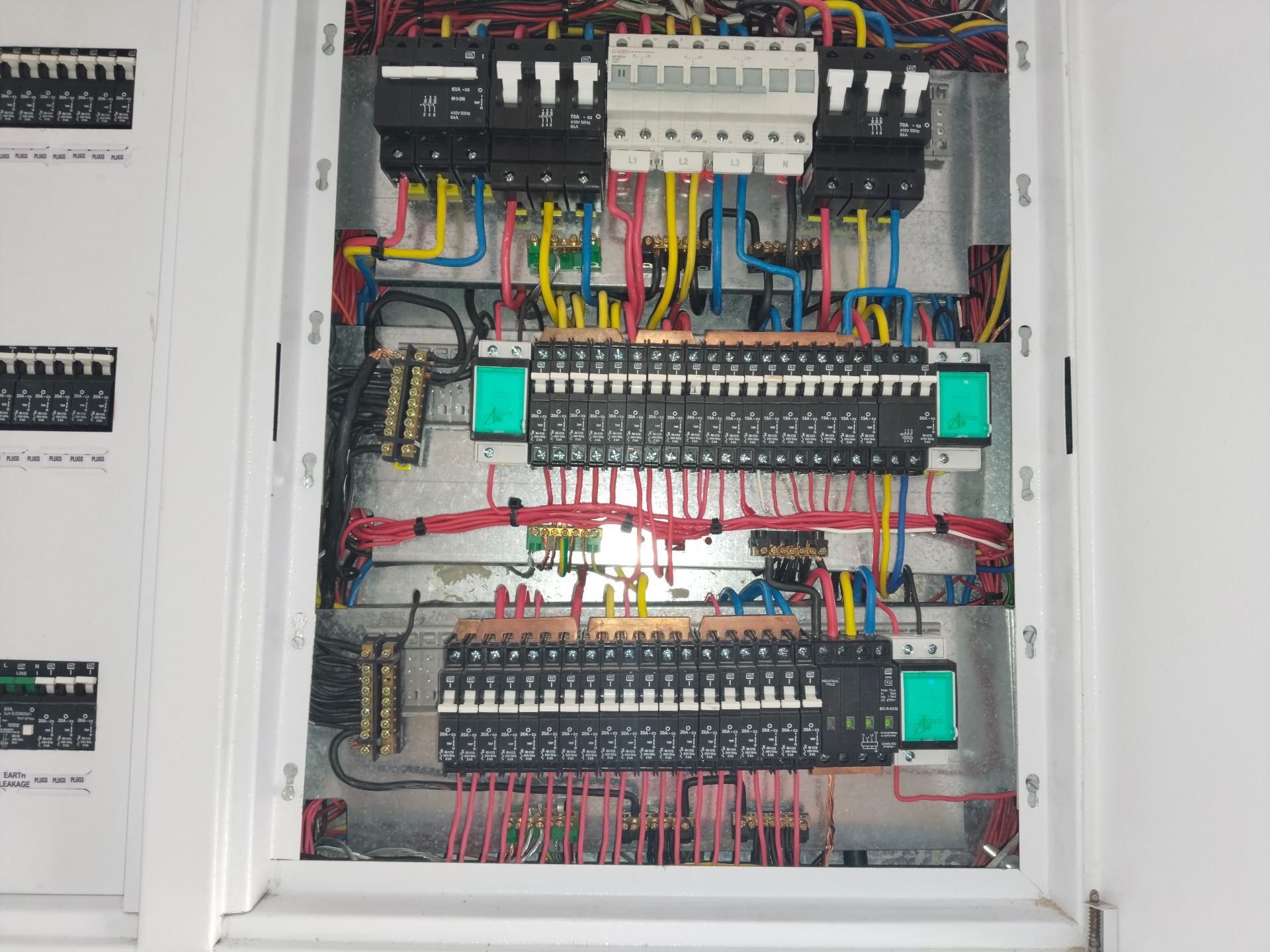 Three-phase board wiring behind the cover